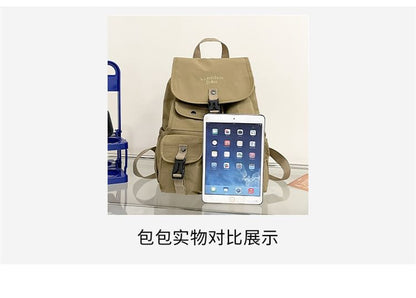 Lettering Embroidered Buckled Nylon Flap Backpack