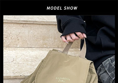 Lettering Embroidered Buckled Nylon Flap Backpack