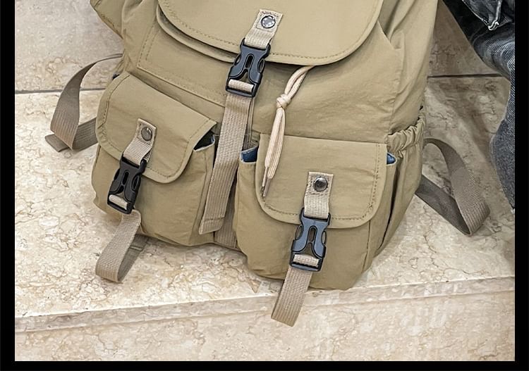 Lettering Embroidered Buckled Nylon Flap Backpack