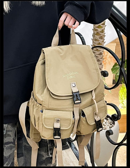 Lettering Embroidered Buckled Nylon Flap Backpack