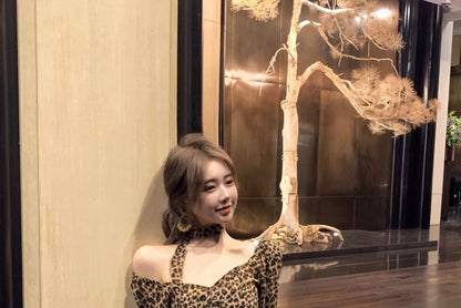 Choker-Neck Long-Sleeve Leopard Print Asymmetrical Ruffled Blouse