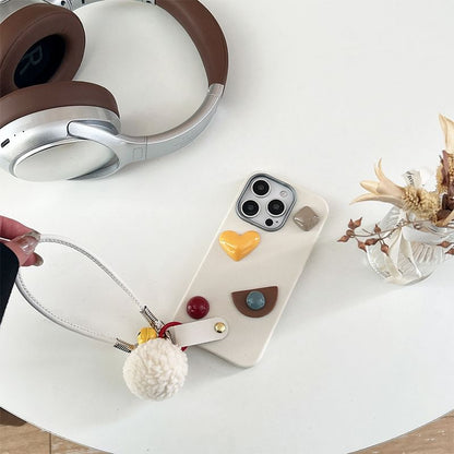 Geometric Phone Case with Pom Pom Strap