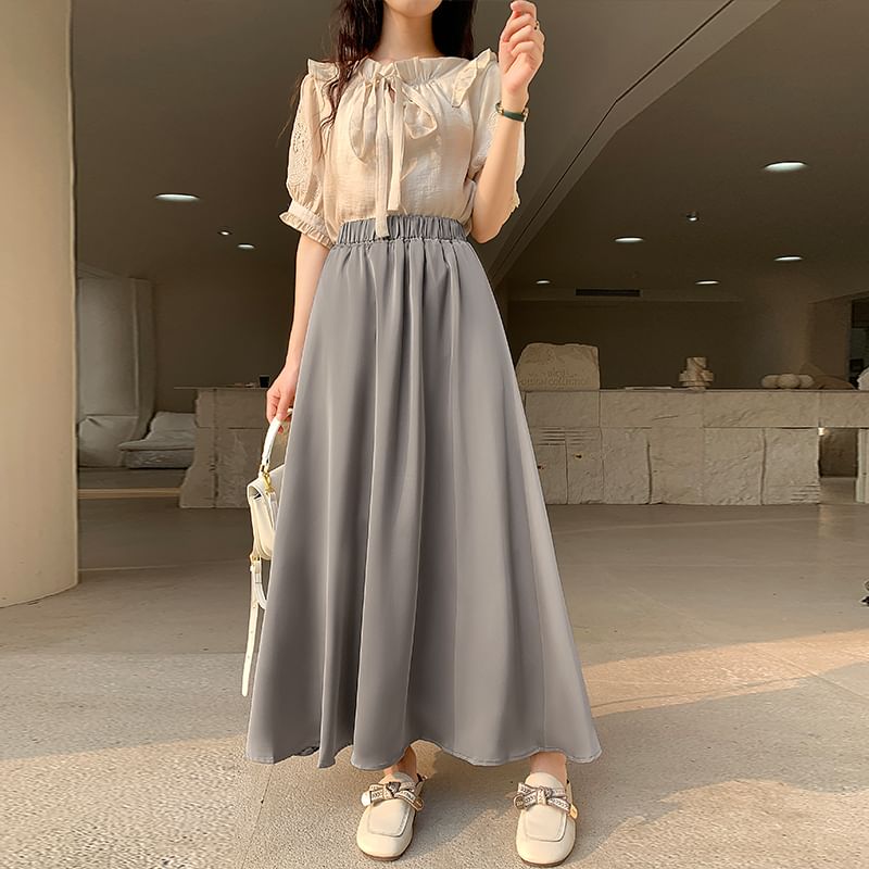 Solid High-Rise Flared Maxi Skirt with Clean Lines