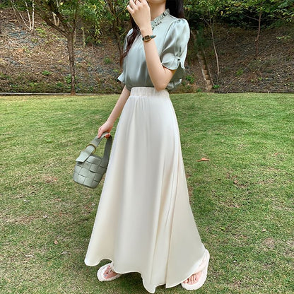 Solid High-Rise Flared Maxi Skirt with Clean Lines