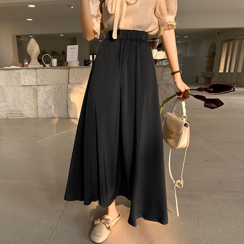 Solid High-Rise Flared Maxi Skirt with Clean Lines