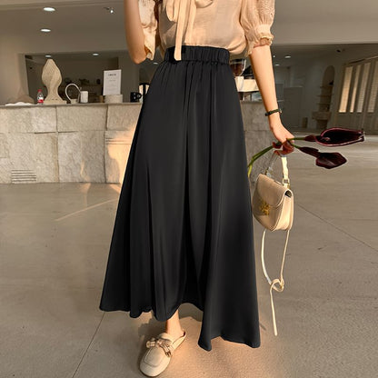 Solid High-Rise Flared Maxi Skirt with Clean Lines