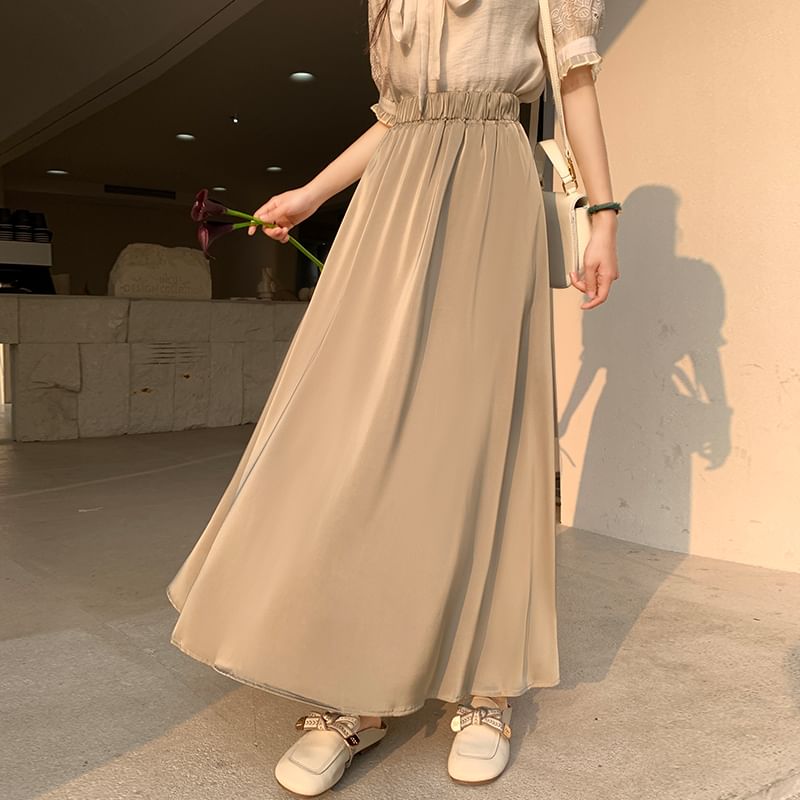 Solid High-Rise Flared Maxi Skirt with Clean Lines