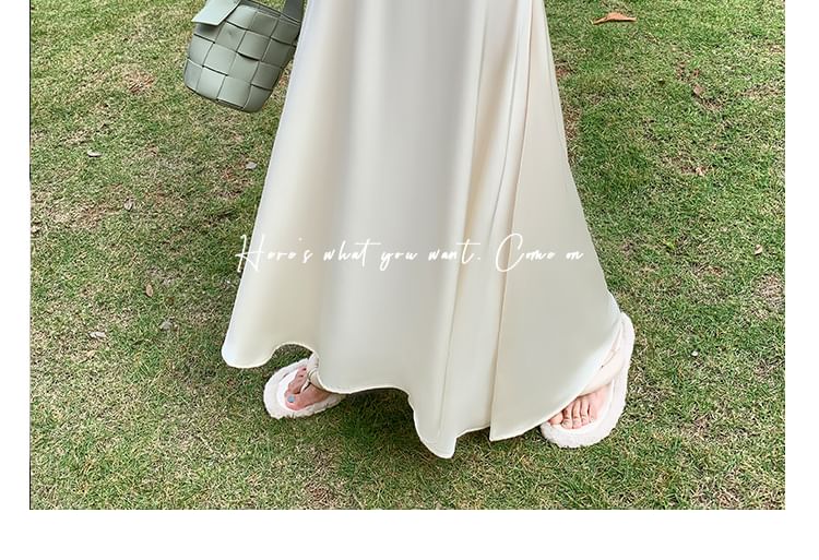 Solid High-Rise Flared Maxi Skirt with Clean Lines