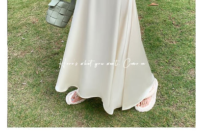 Solid High-Rise Flared Maxi Skirt with Clean Lines
