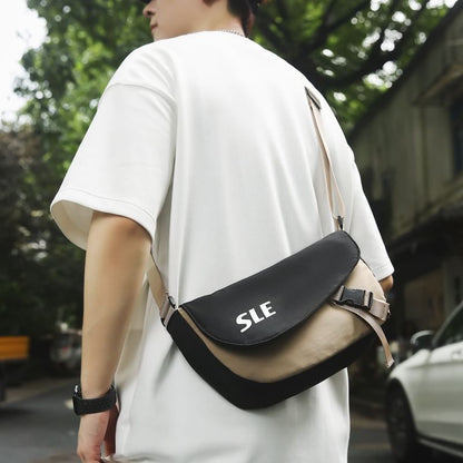 Lettering Two-Tone Buckled Flap Crossbody Bag