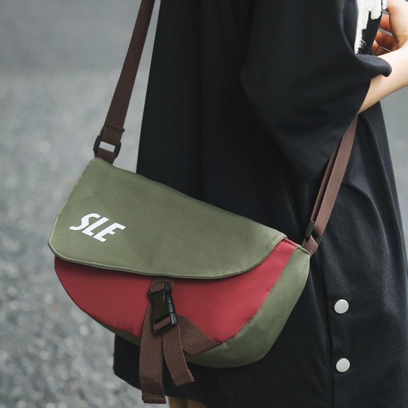 Lettering Two-Tone Buckled Flap Crossbody Bag