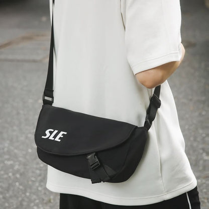 Lettering Two-Tone Buckled Flap Crossbody Bag