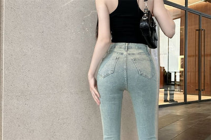 High Rise Cutout Washed Flared Jeans