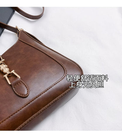Faux Leather Buckled Crossbody Bag
