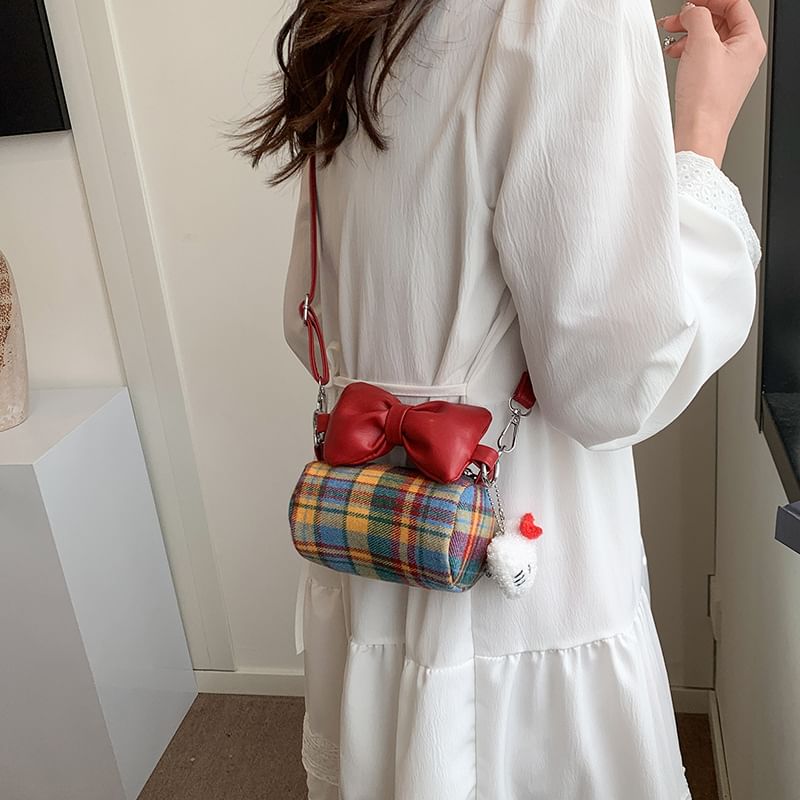 Bow Accent Cylinder Crossbody Bag