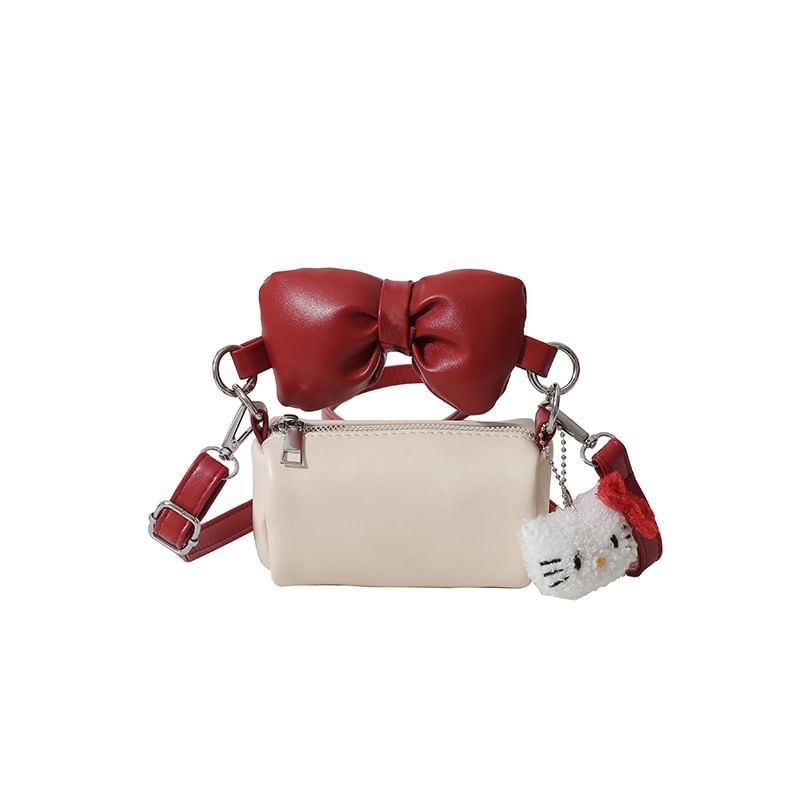 Bow Accent Cylinder Crossbody Bag