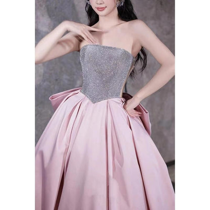 Strapless Sequin Panel Bow Back Ball Gown