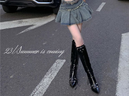 Mid Rise Washed Tassel Trim Mini A-Line Denim Skirt