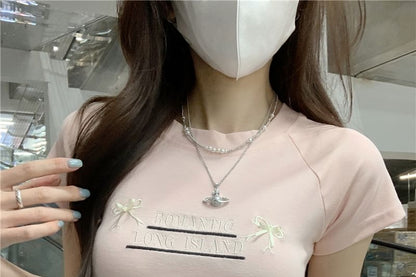 Short-Sleeve Round Neck Lettering Embroidered Bow Accent Cutout Crop Tee