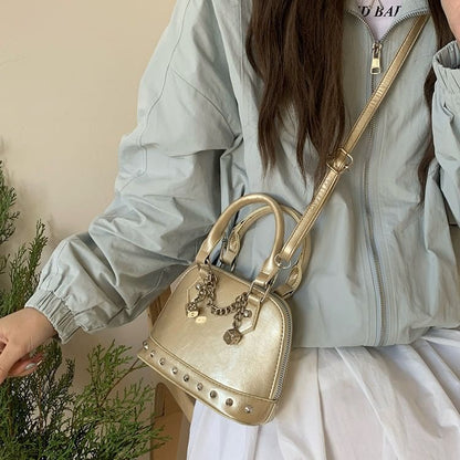 Sac bandoulière en similicuir clouté