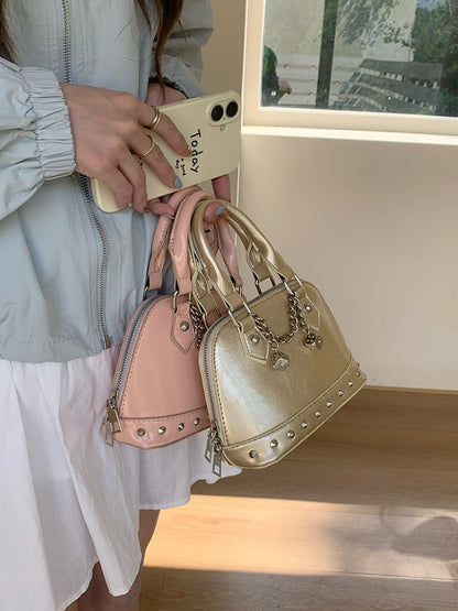 Sac bandoulière en similicuir clouté