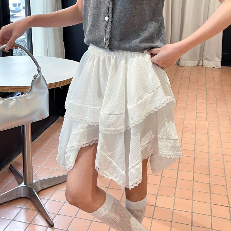 Asymmetric Hem Mini Skirt with Lace Trim and High Waist