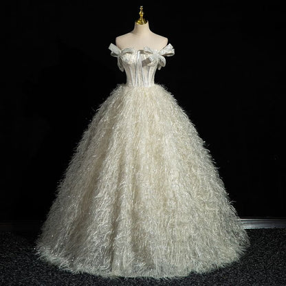 Strapless Glitter Bow Accent Fringed Corset Ball Gown