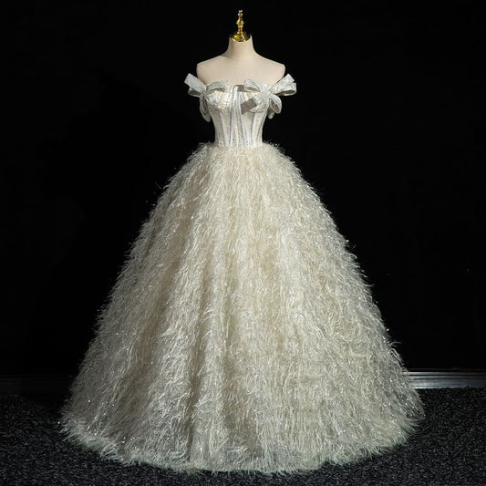 Strapless Glitter Bow Accent Fringed Corset Ball Gown