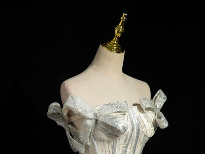 Strapless Glitter Bow Accent Fringed Corset Ball Gown