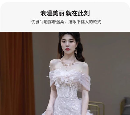 Off-Shoulder Evening Mesh Sequin Accent Gown Flower Panel Mermaid