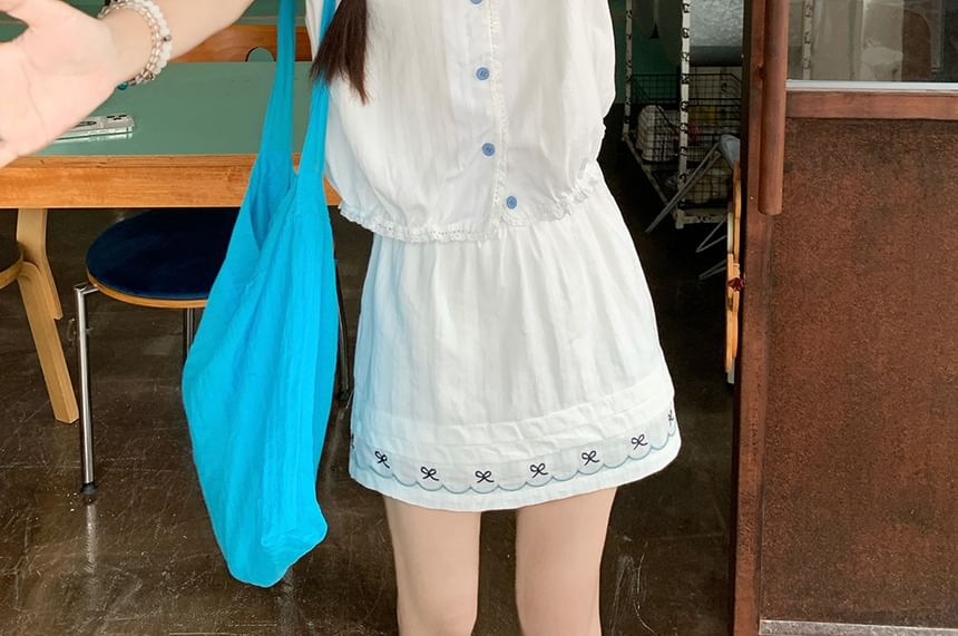 Short-Sleeve Button Shirt Paired with Mini A-Line Skirt