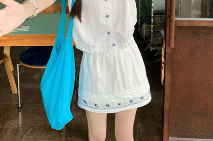 Short-Sleeve Button Shirt Paired with Mini A-Line Skirt