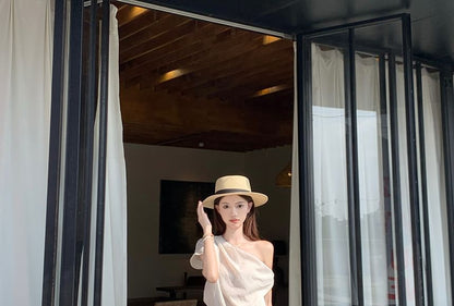 Sleeveless Off-Shoulder Top with High-Rise Smooth Flared Long Skirt
