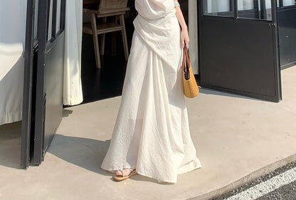 Sleeveless Off-Shoulder Top with High-Rise Smooth Flared Long Skirt