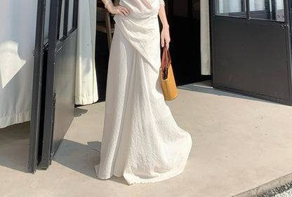 Sleeveless Off-Shoulder Top with High-Rise Smooth Flared Long Skirt