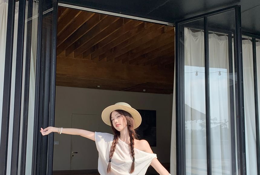 Sleeveless Off-Shoulder Top with High-Rise Smooth Flared Long Skirt