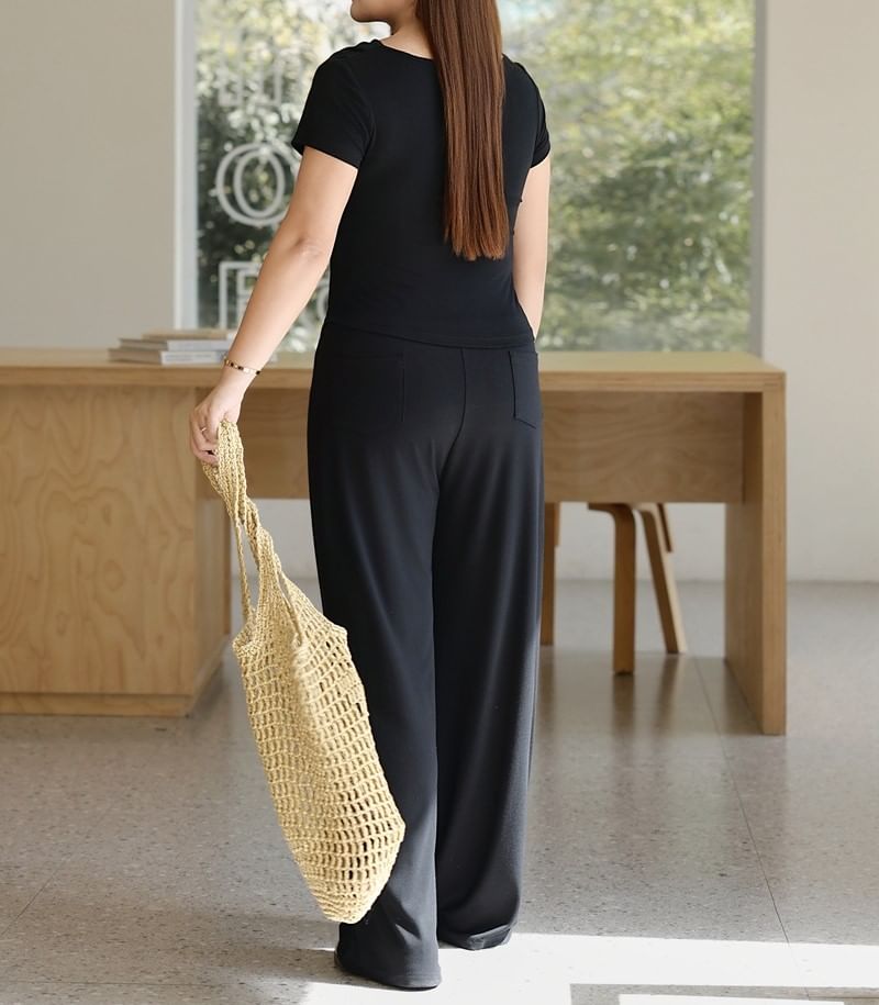 Plus Size Off-Shoulder Sleeveless Asymmetric Tee with High-Rise Wide Leg Pants and Flared Maxi Skirt