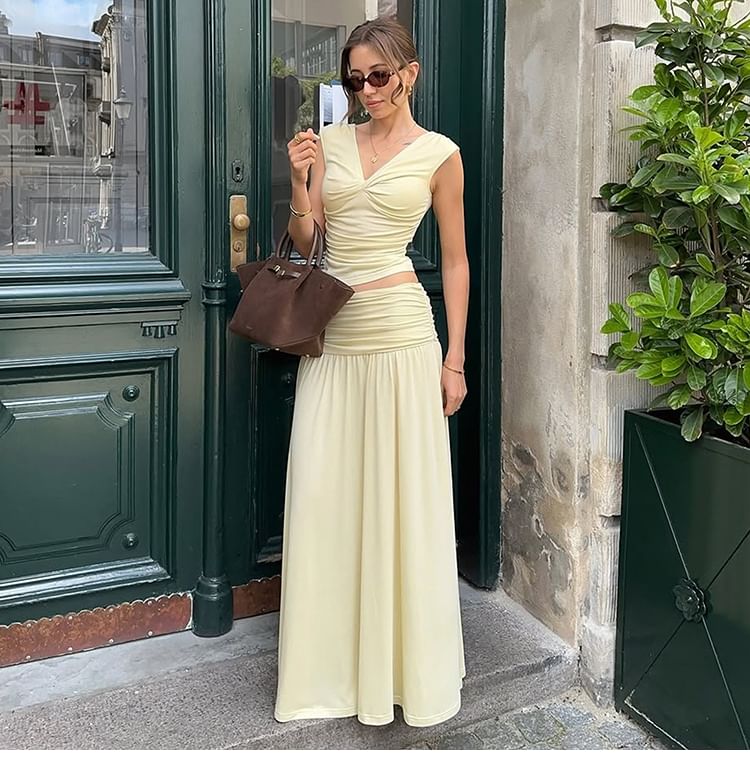 Sleeveless V-Neck Ruched Top Paired with Mid-Rise Flared Long Skirt