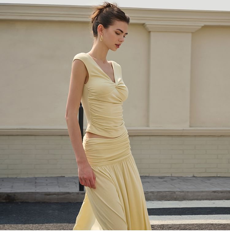 Sleeveless V-Neck Ruched Top Paired with Mid-Rise Flared Long Skirt