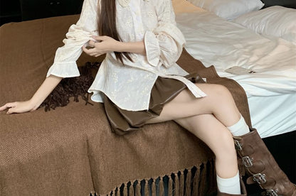 Faux Leather Mini Skirt with Long-Sleeve Lace Shirt