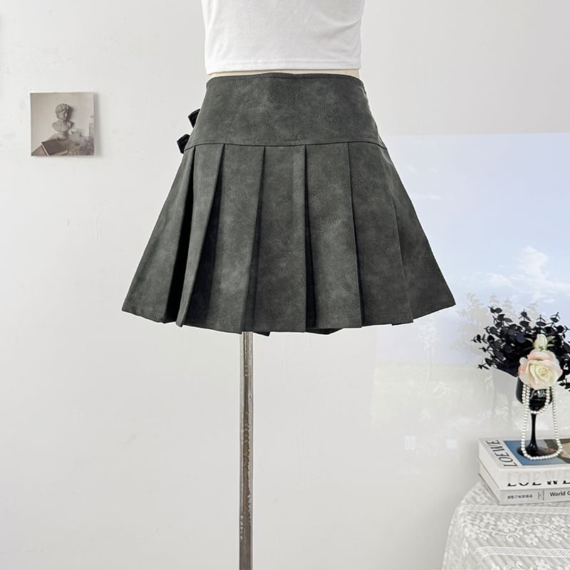 Faux Leather Mini Pleated Skirt with Buckle Detail