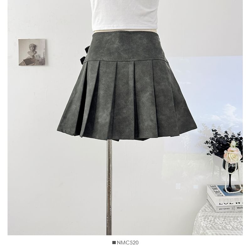 Faux Leather Mini Pleated Skirt with Buckle Detail