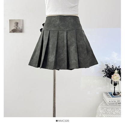 Faux Leather Mini Pleated Skirt with Buckle Detail