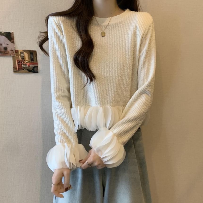 Crewneck Long-Sleeve Ruffle-Hem Knit Pullover in Solid Tone
