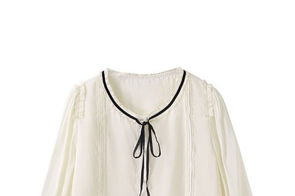 Button-Front Blouse with Contrast Trim and Round Neckline