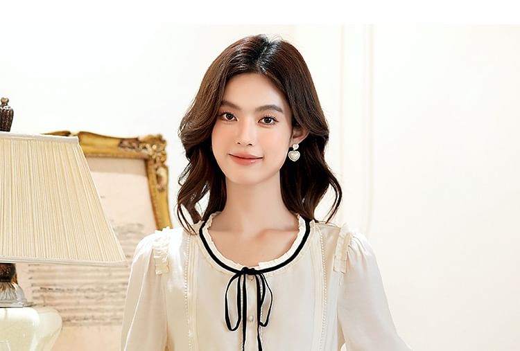 Button-Front Blouse with Contrast Trim and Round Neckline