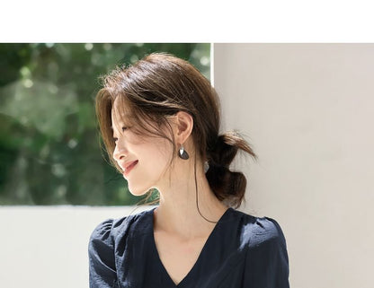 Solid Button-Front Blouse with V-Neckline and Long Sleeves