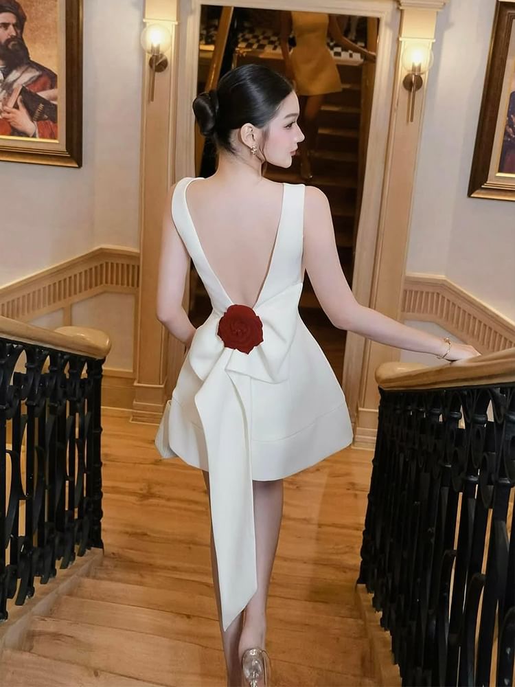 Sleeveless Boat Neck Bow Accent Open Back Mini A-Line Cocktail Dress