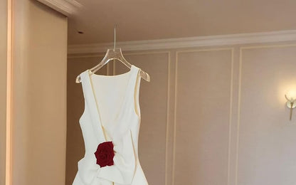 Sleeveless Boat Neck Bow Accent Open Back Mini A-Line Cocktail Dress