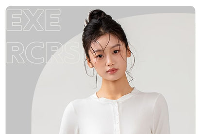 Half-Buttoned Solid Long-Sleeve Top